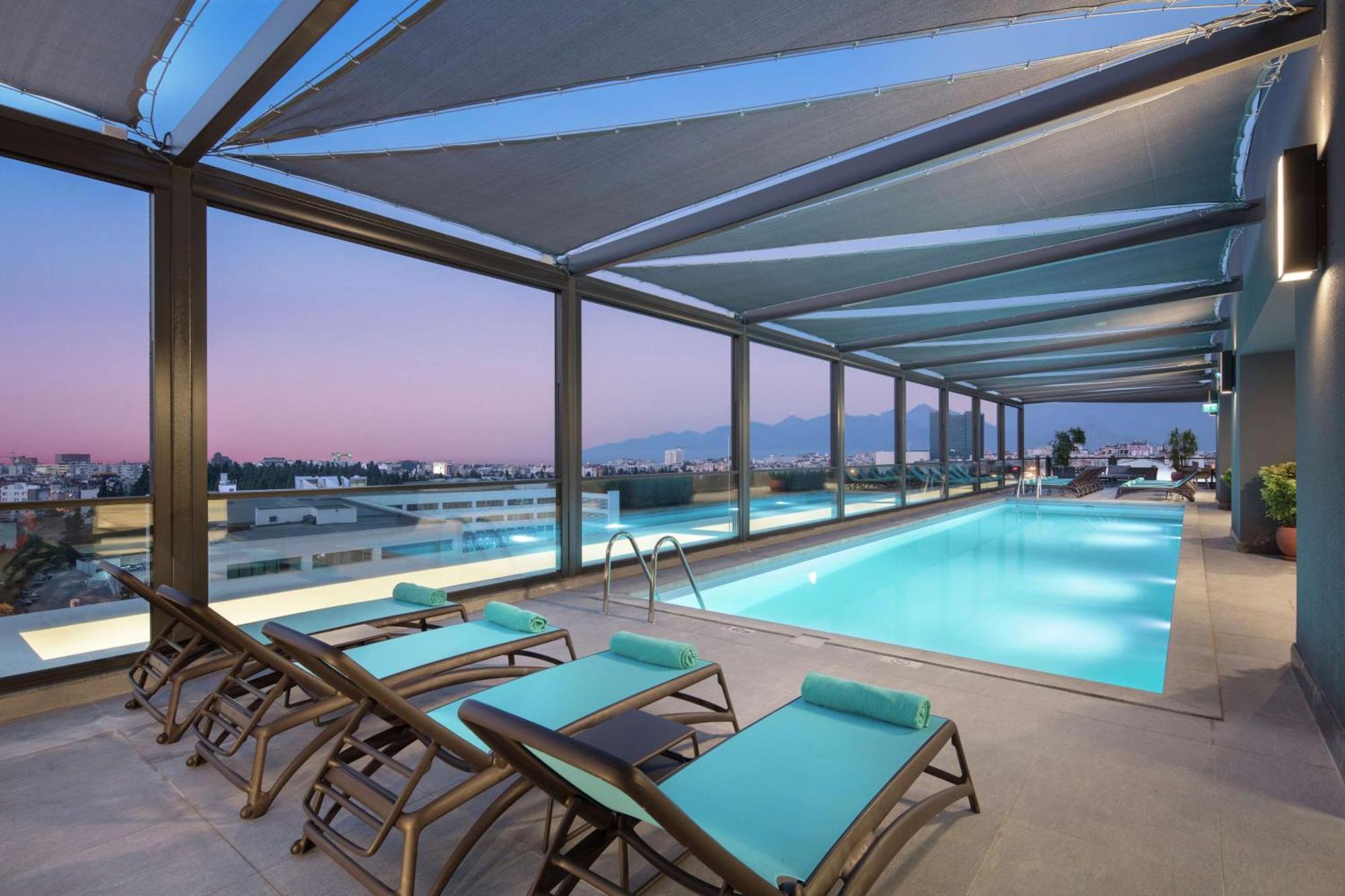 Doubletree By Hilton Antalya City Centre Екстериор снимка The pool at the hotel